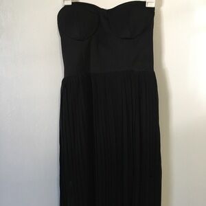 Black Strapless Sweetheart Cut Pleated Sheer dress.